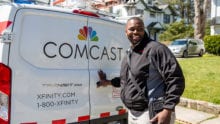 man with a comcast truck