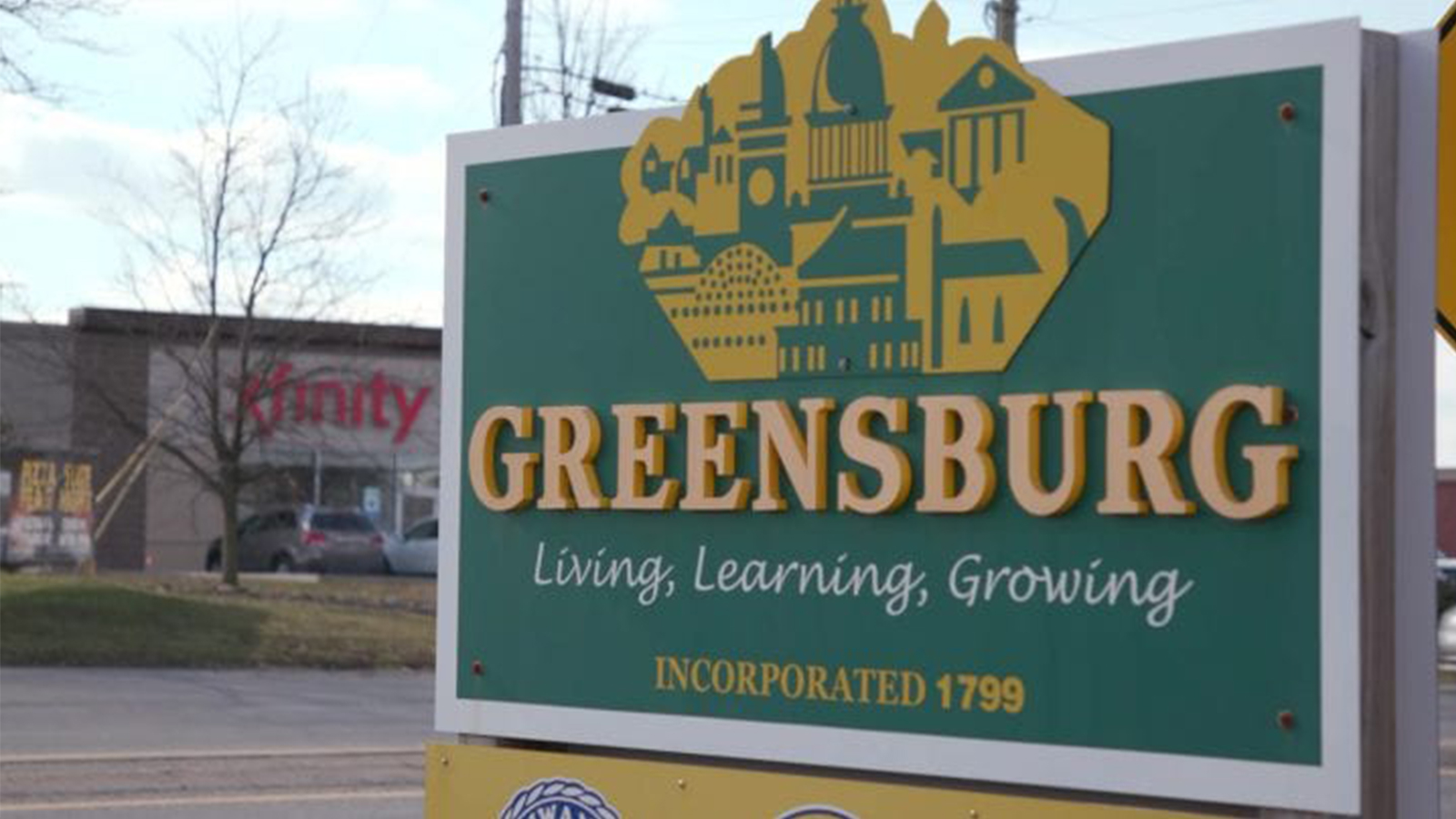 Greensburg sign in front of Xfinity Store.