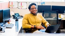 Comcast employee in office
