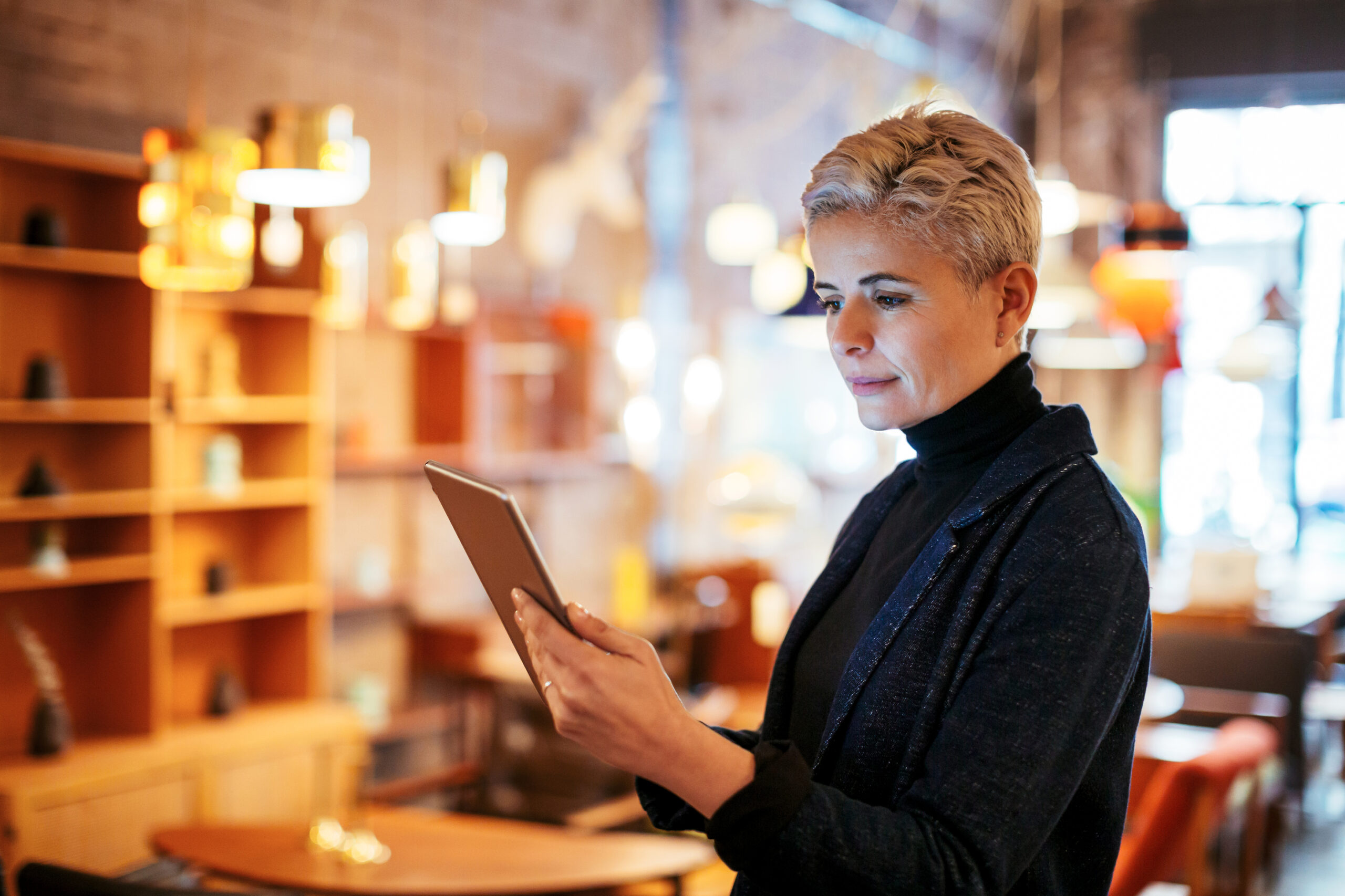 Woman looking at tablet