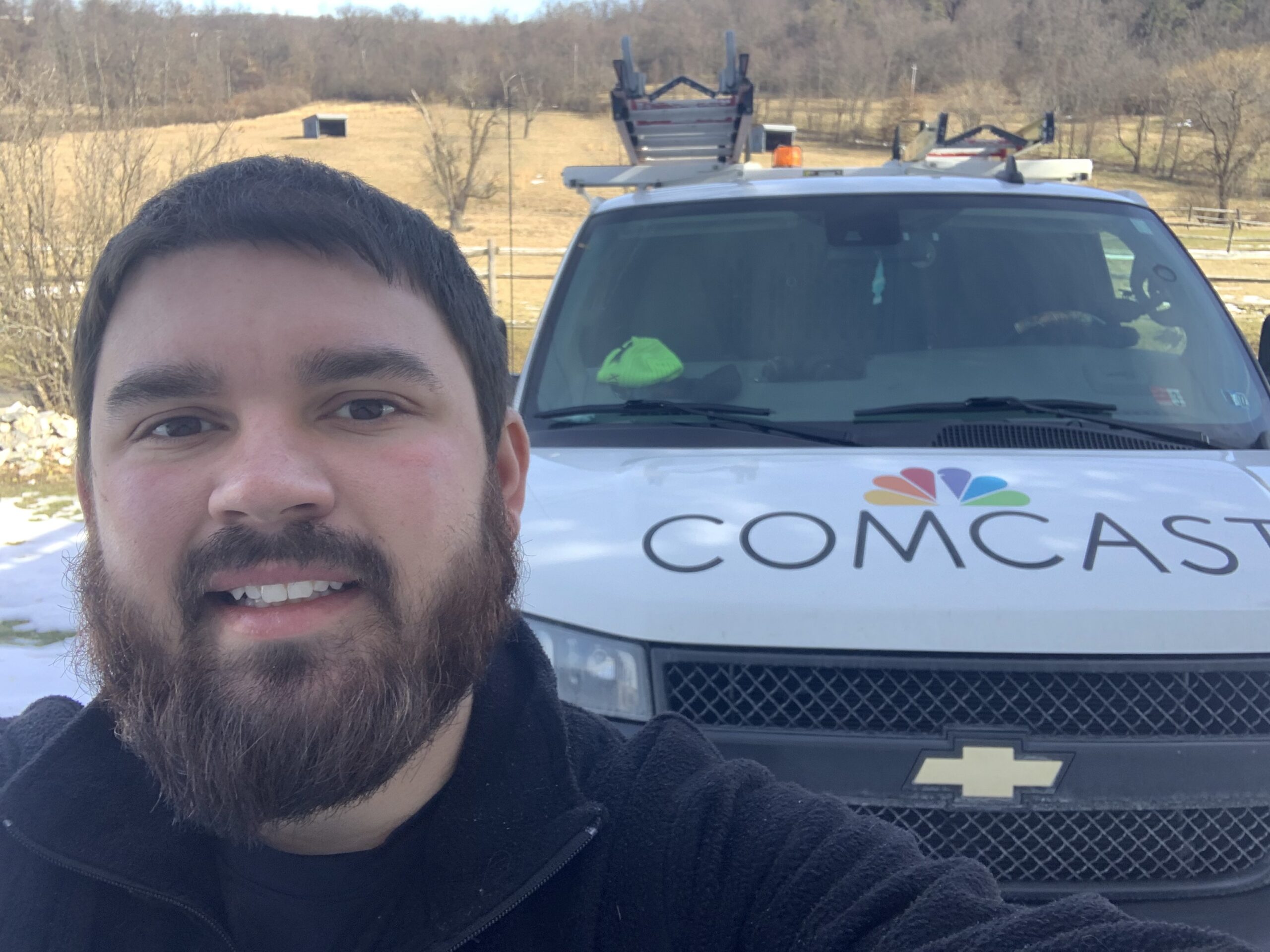 technician in front of truck